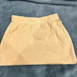 Light mustard yellow mini skirt